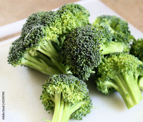 Fresh Broccoli On Cutting Board