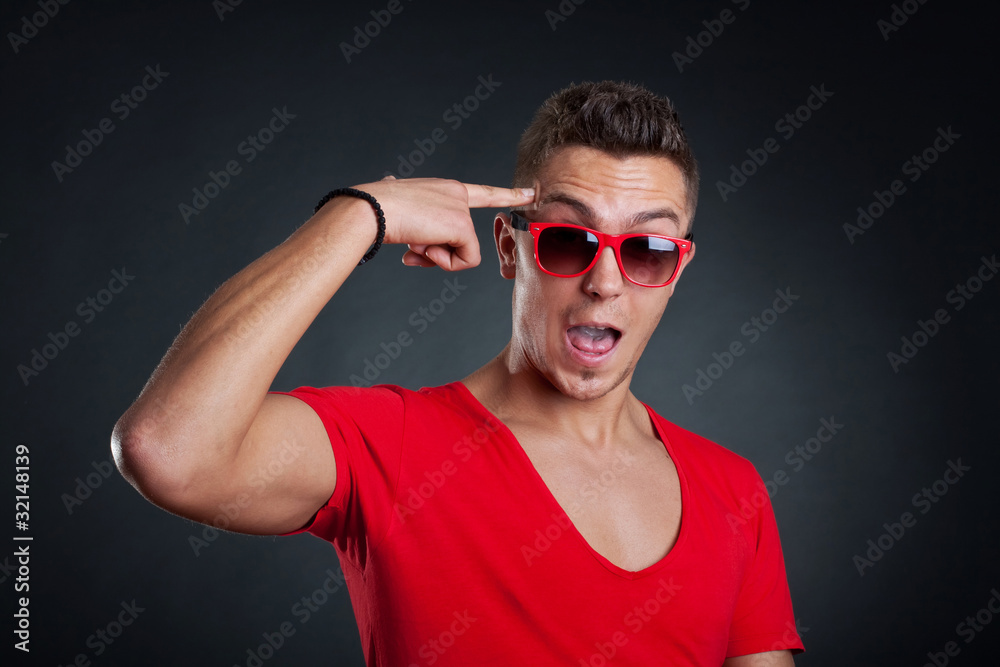 man with sunglasses making a funny face man with sunglasses making a funny face
