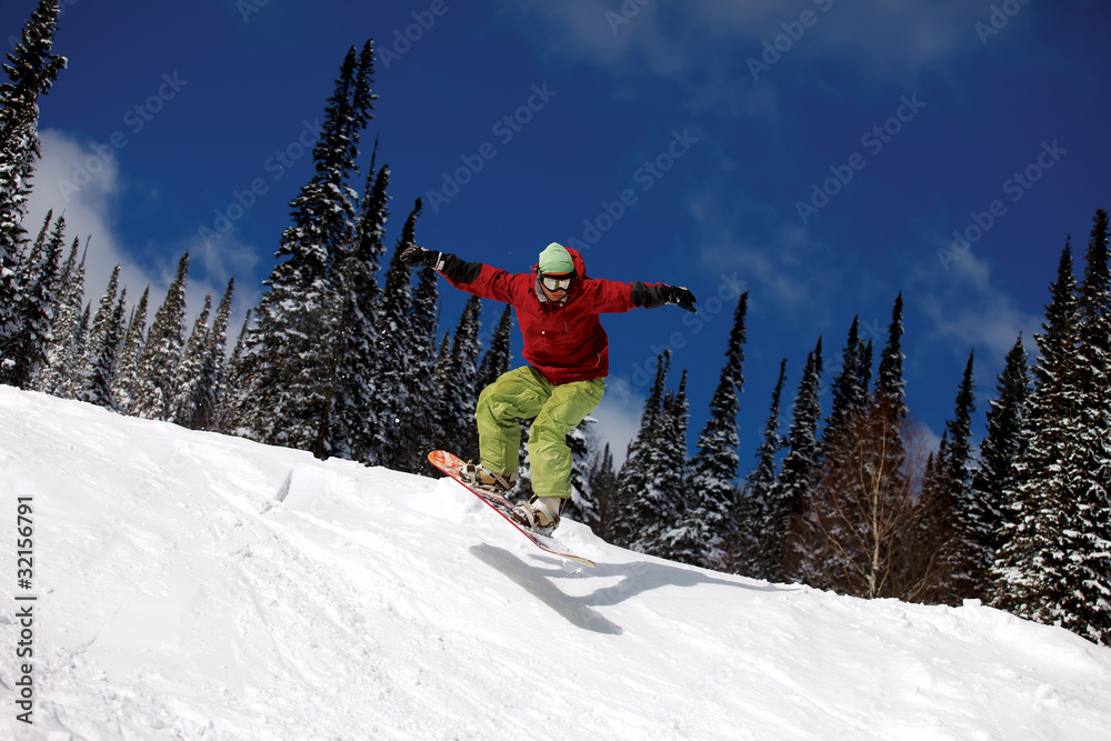 Snowboarder jumping