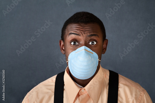 Canvas Print Young Man with Surgical Mask