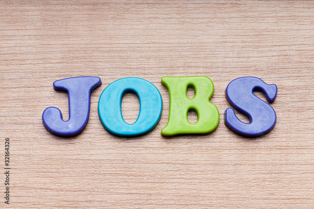 Employment concept with letters on background