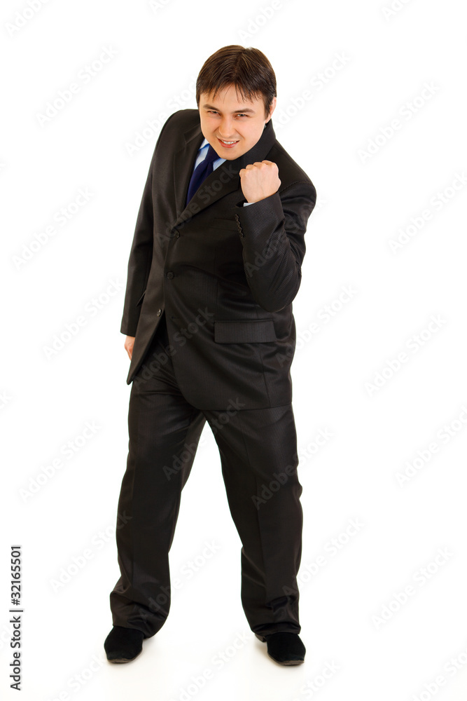 Full length portrait of businessman rejoicing his success Full length portrait of businessman rejoicing his success