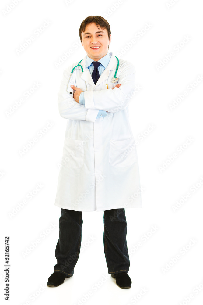 Full length portrait of doctor with crossed arms on chest Full length portrait of doctor with crossed arms on chest