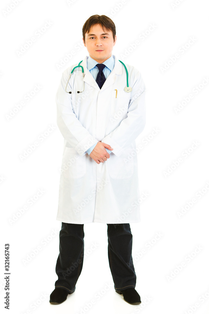 Full length portrait of doctor in uniform with stethoscope Full length portrait of doctor in uniform with stethoscope