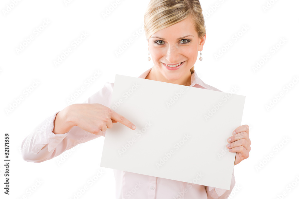 Businesswoman pointing front at empty banner Businesswoman pointing front at empty banner