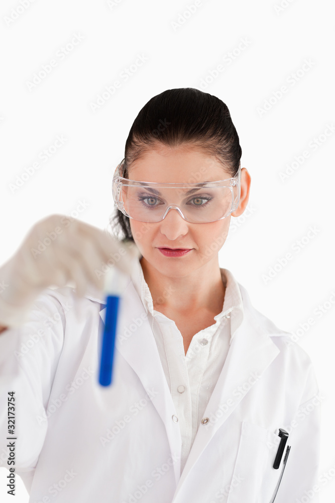 Isolated scientist conducting an experiment Isolated scientist conducting an experiment