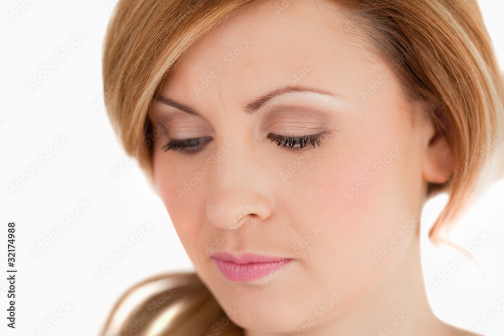 Isolated blond-haired woman looking at the camera Isolated blond-haired woman looking at the camera