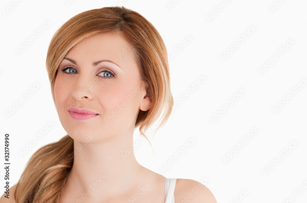 Cute blond-haired woman looking at the camera Cute blond-haired woman looking at the camera