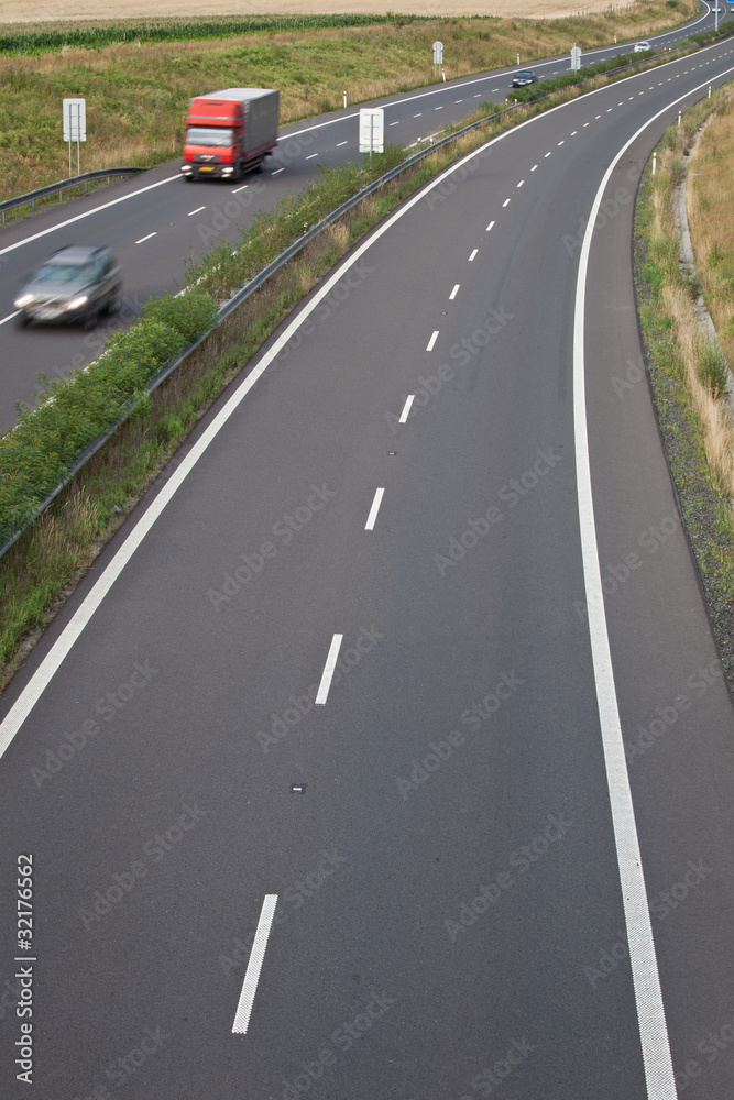 highway traffic (motion blurred image, color toned image)