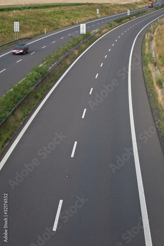 highway traffic (motion blurred image, color toned image)