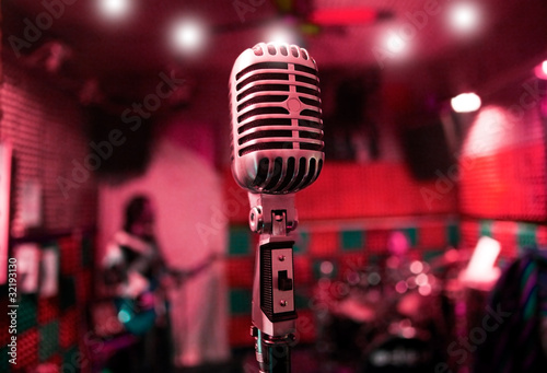 Canvas Print musical background with music band and vintage microphone