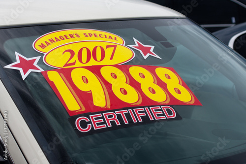 price sticker on used car lot