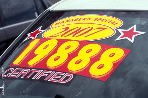 price sticker on used car lot