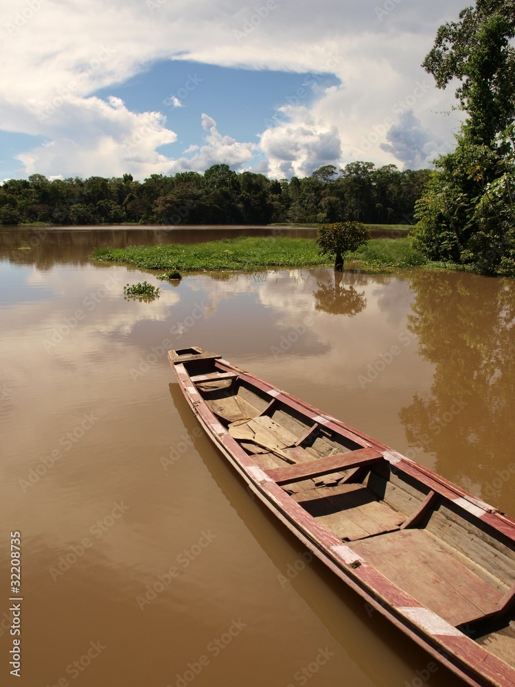 Boat parked at the lodge of Amazon river lagoon in Peru