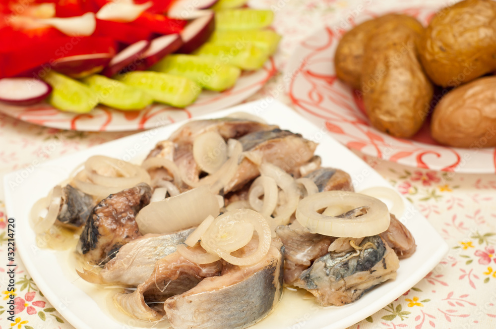 Herring with onions isolated on white background