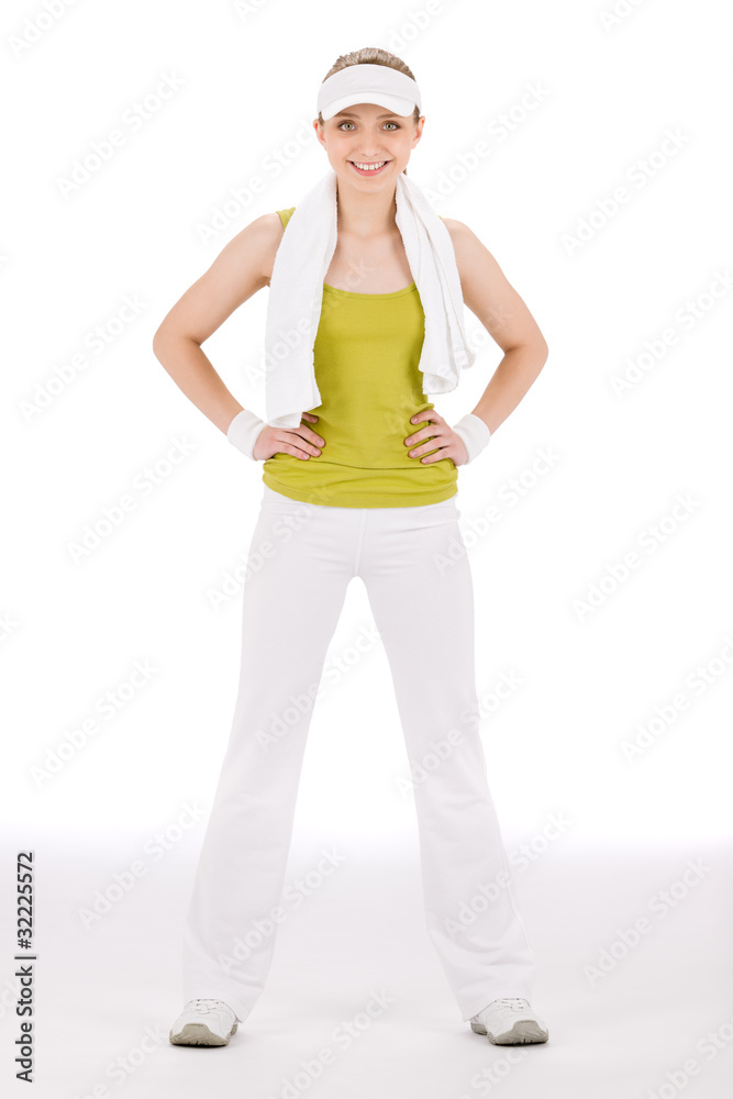 Fitness teenager woman in sportive outfit hold waist Fitness teenager woman in sportive outfit hold waist