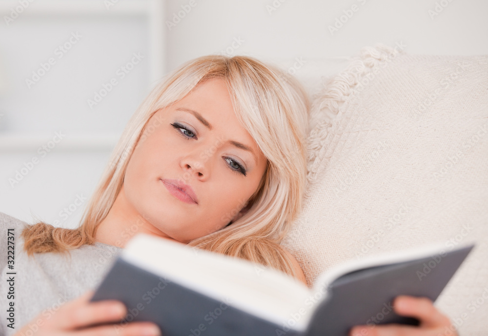A pretty woman reading a book A pretty woman reading a book