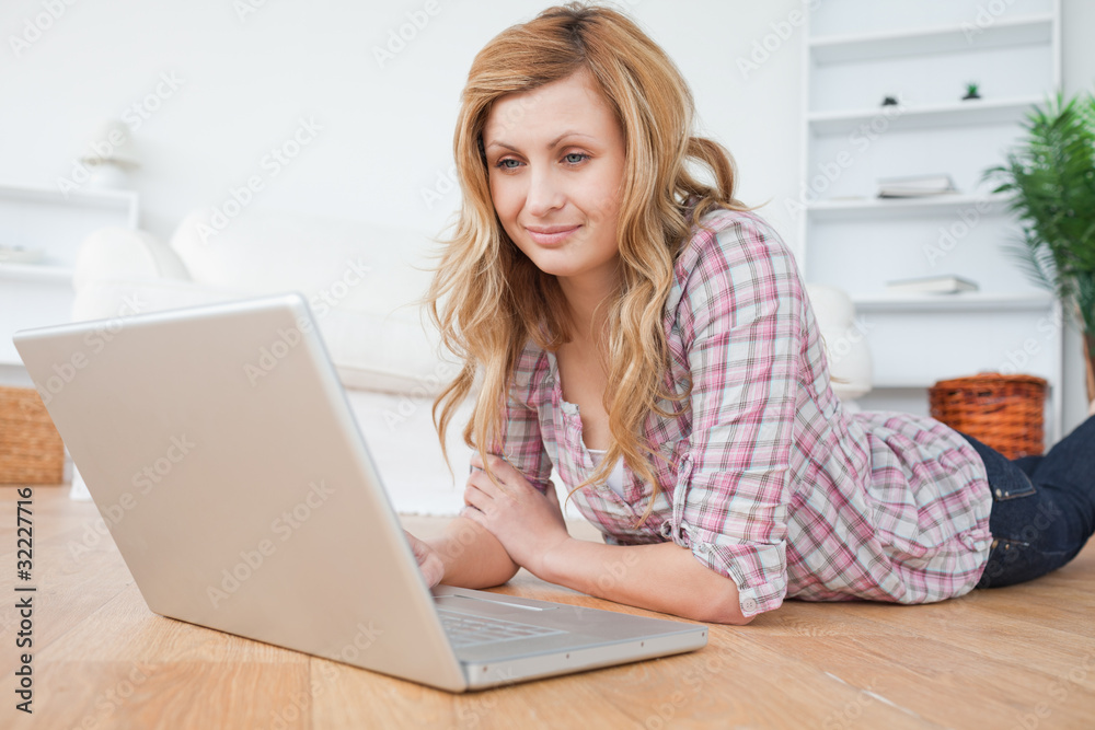 Attractive woman chatting on her laptop Attractive woman chatting on her laptop