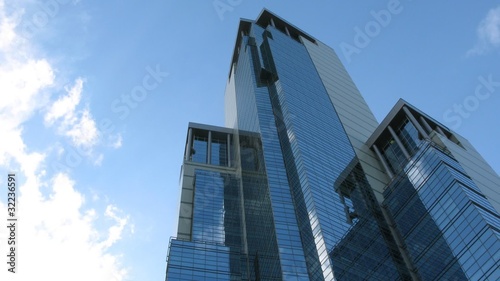 Clouds reflect in newly build skyscraper in Moscow, time lapse photo