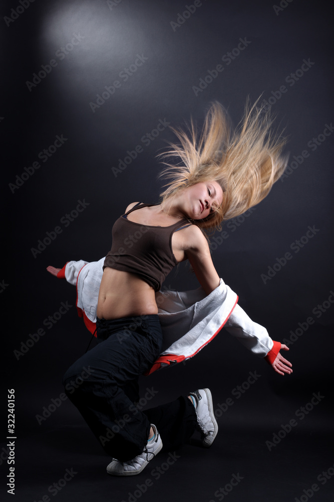 young woman modern dancer in action