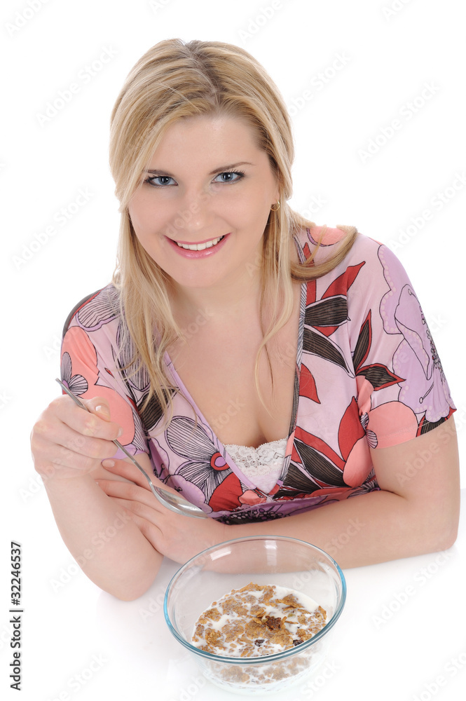 beautiful female having muesli cereals for breakfast. isolated o beautiful female having muesli cereals for breakfast. isolated o