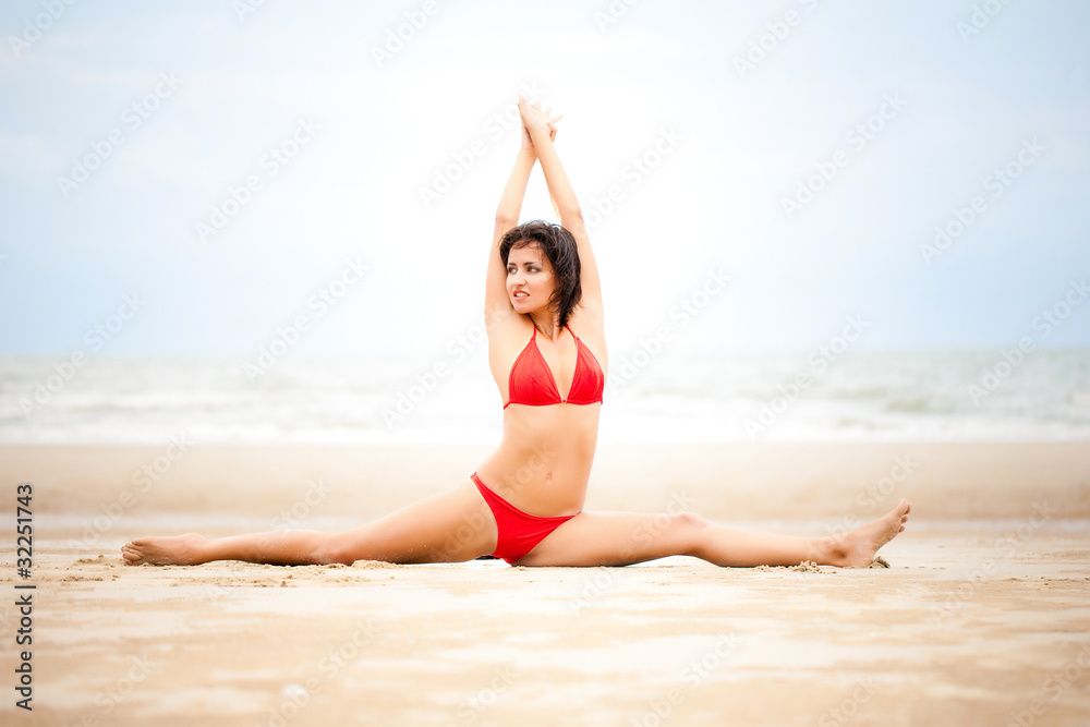 Beautiful woman doing stretches exercise Beautiful woman doing stretches exercise