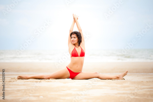 Beautiful woman doing stretches exercise