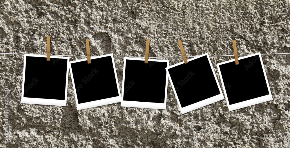 Polaroid appese con mollette Stock Photo | Adobe Stock
