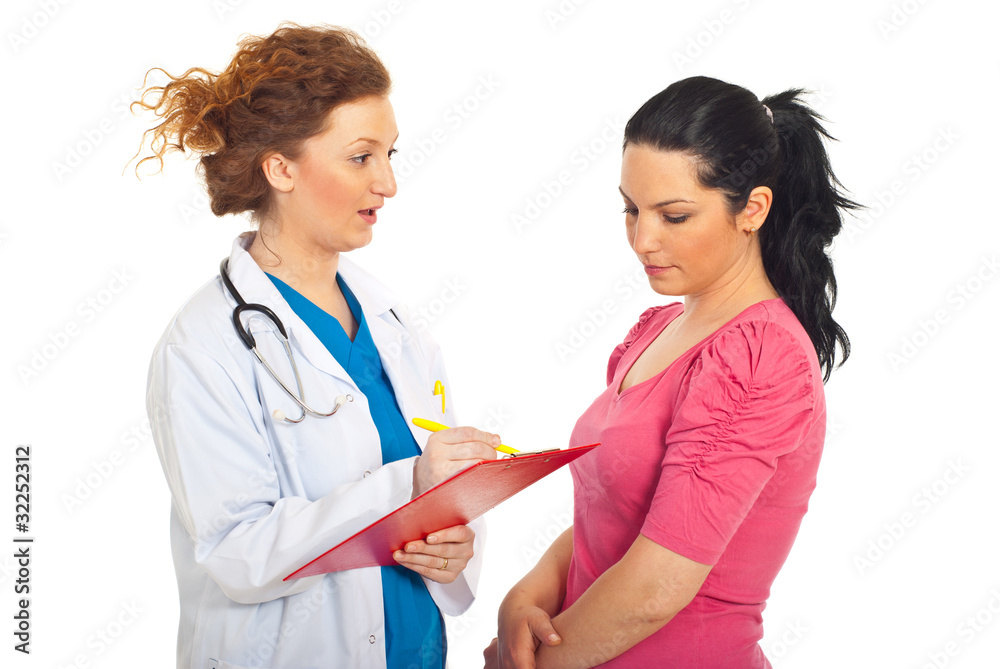 Doctor having conversation with patient woman Doctor having conversation with patient woman