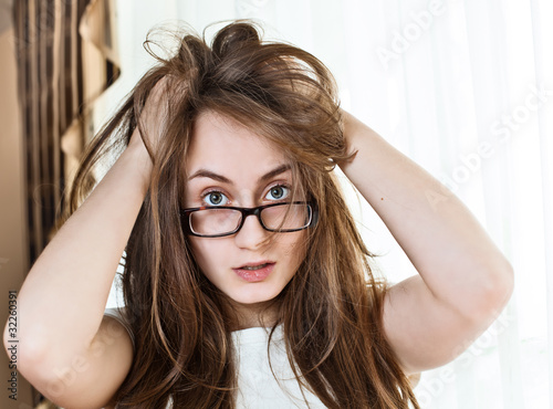 Young woman with disheveled hair