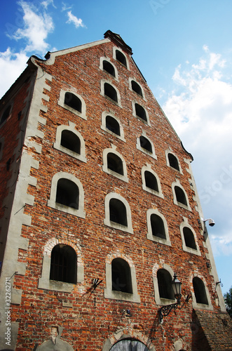 Old brick granary and blue sky