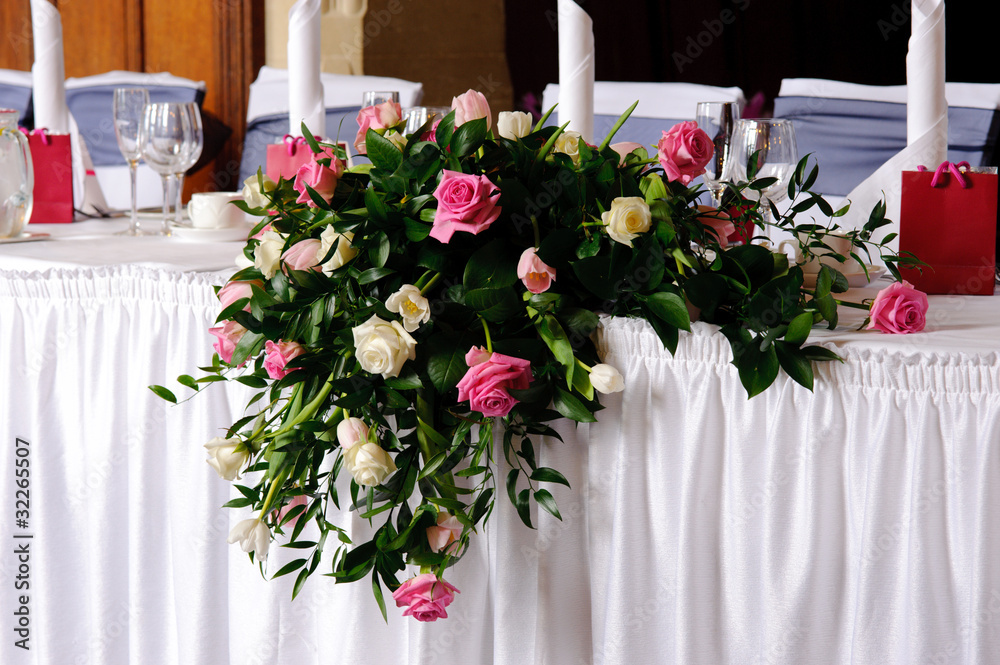 Head table at wedding reception decorated