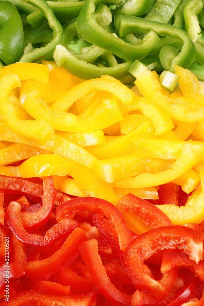 Green, red and yellow bell-pepper background Green, red and yellow bell-pepper background