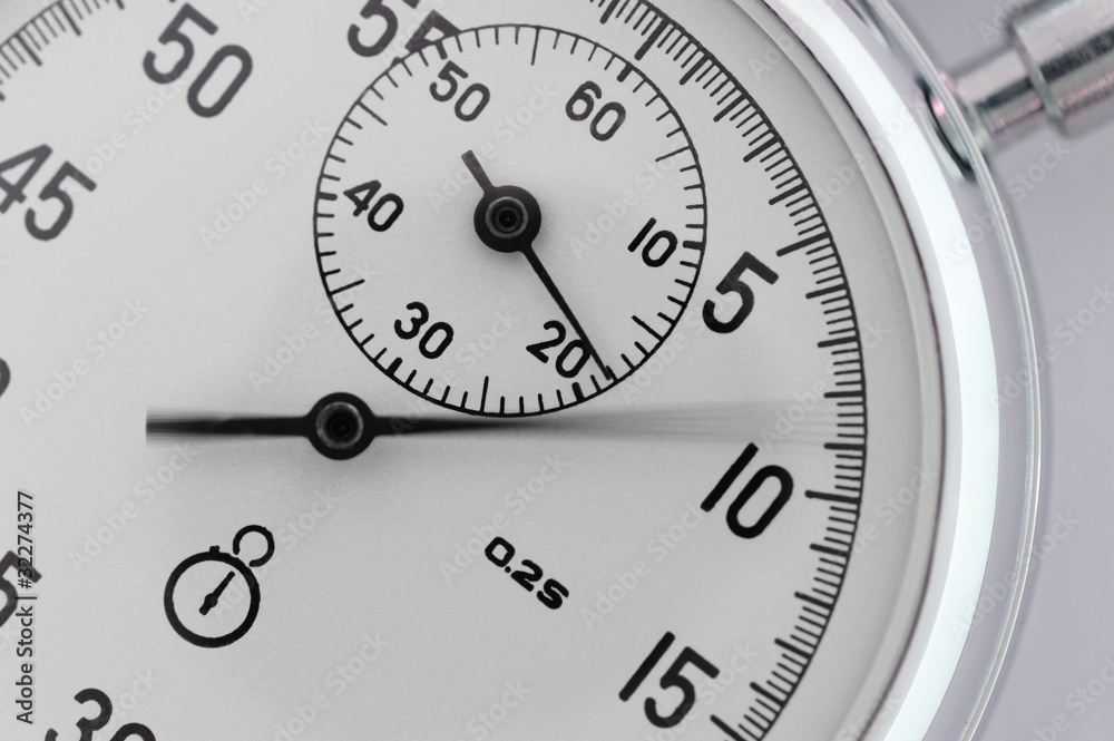 Stopwatch closeup. With a moving arrow Stopwatch closeup. With a moving arrow
