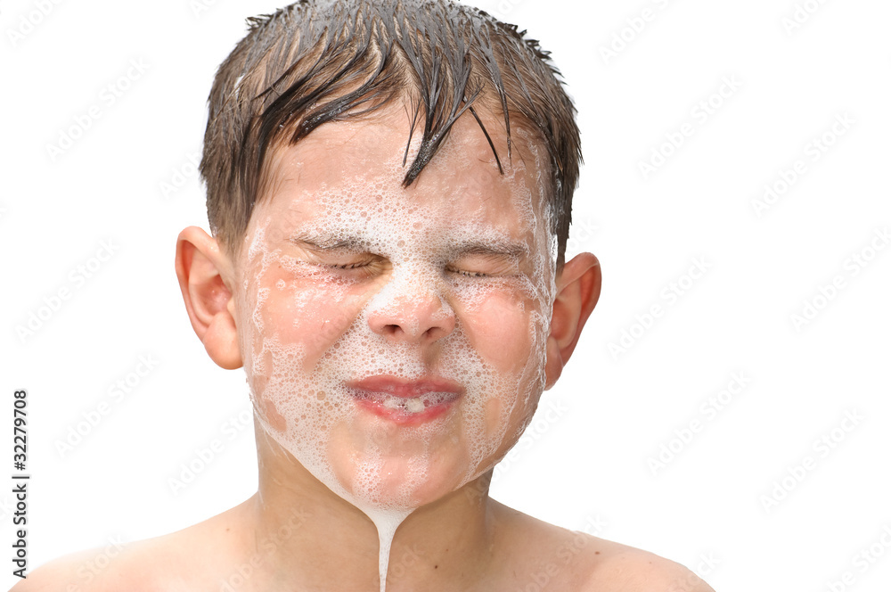 Obraz premium A boy swims in the bathtub