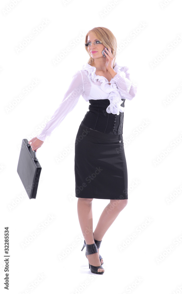 A young and attractive businesswoman in formal clothes A young and attractive businesswoman in formal clothes