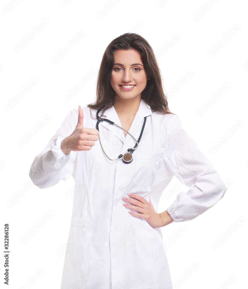 A young and attractive brunette female doctor in a white dress A young and attractive brunette female doctor in a white dress