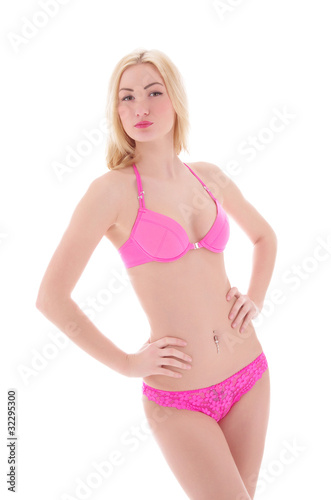 A young and sexy blond Caucasian wiman in pink lingerie