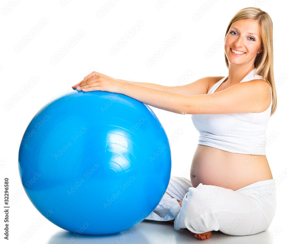 Pregnant woman excercises with gymnastic ball Pregnant woman excercises with gymnastic ball