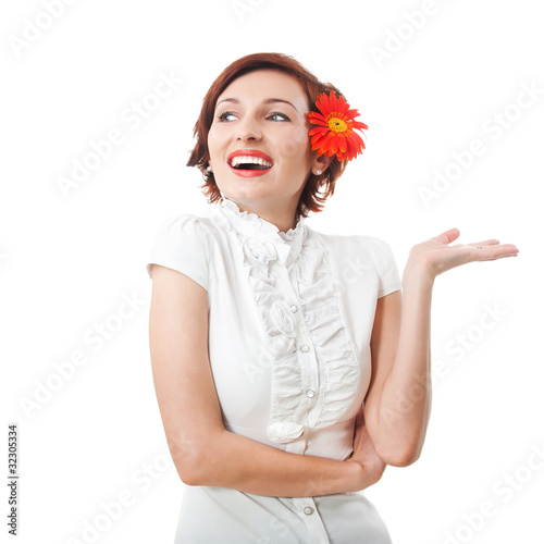 Beautiful woman with flower gerbera against white background