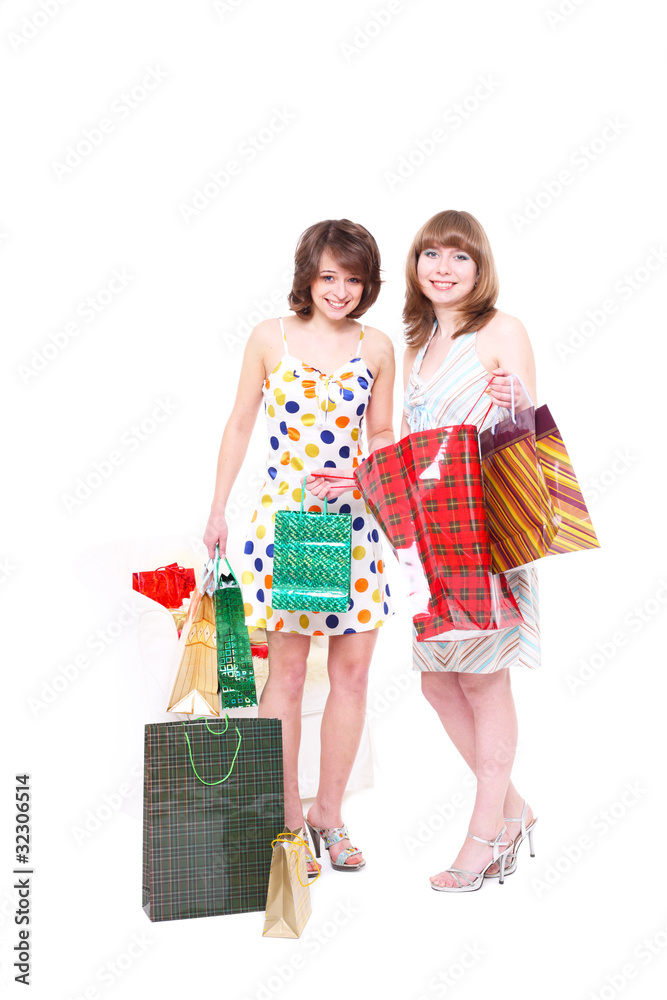 Two happy friends with purchases. Two happy friends with purchases.