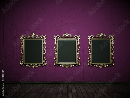 Fototapeta Naklejka Na Ścianę i Meble -  Goldene Bilderrahmen vor lila Wand