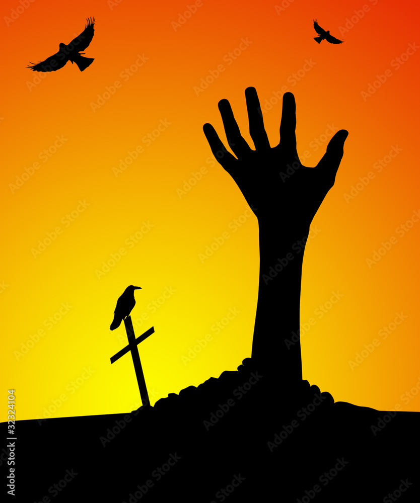 Zombie hand rising out of grave