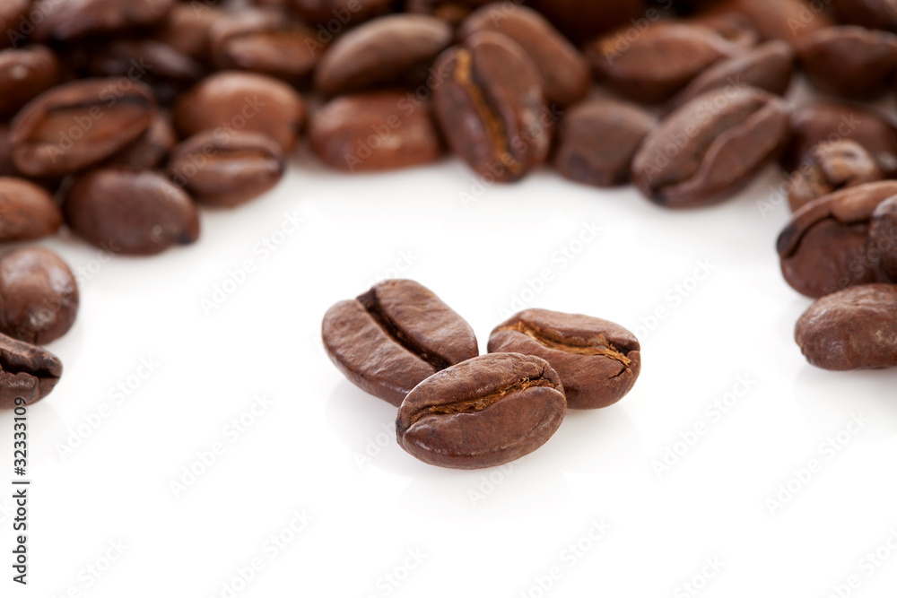 Roasted coffee beans in closeup Roasted coffee beans in closeup
