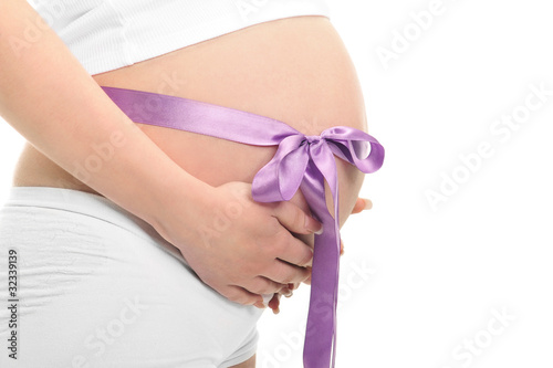 Wallpaper Mural Image of pregnant woman touching her belly with hands Torontodigital.ca