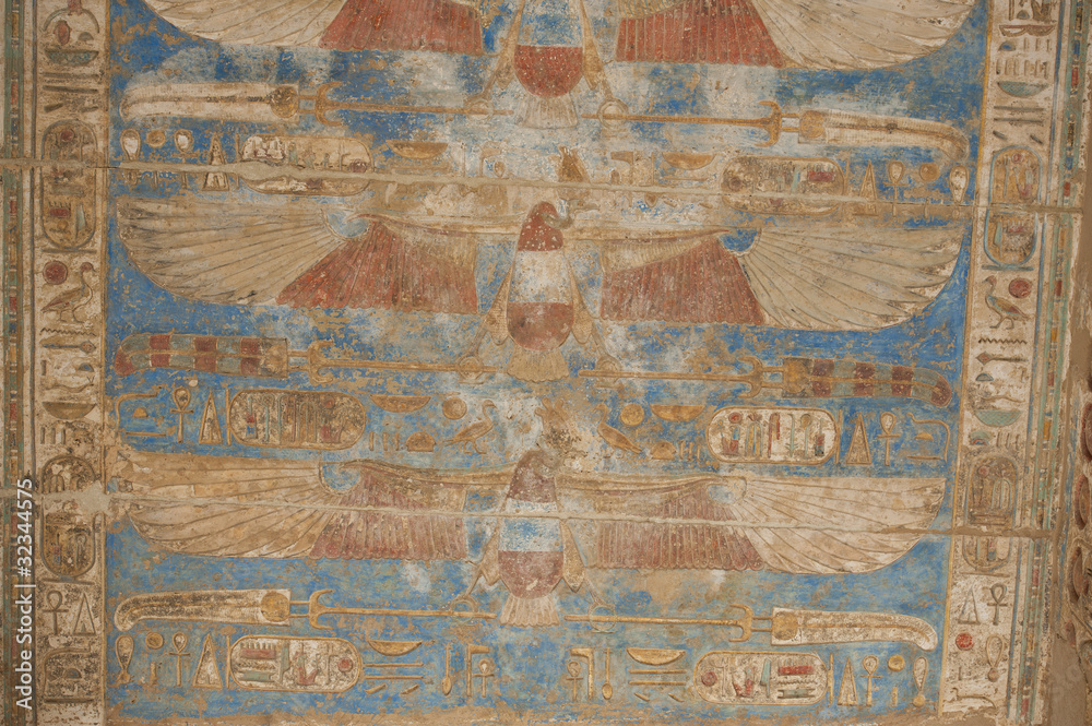 Egyptian hieroglyphics on a temple wall