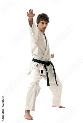 Karate male fighter young isolated on white background