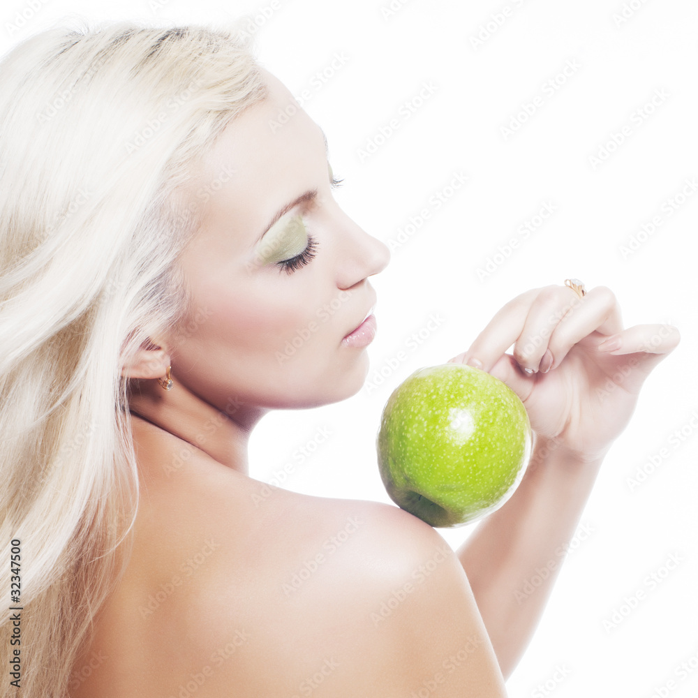 attractive young blonde with green apple attractive young blonde with green apple