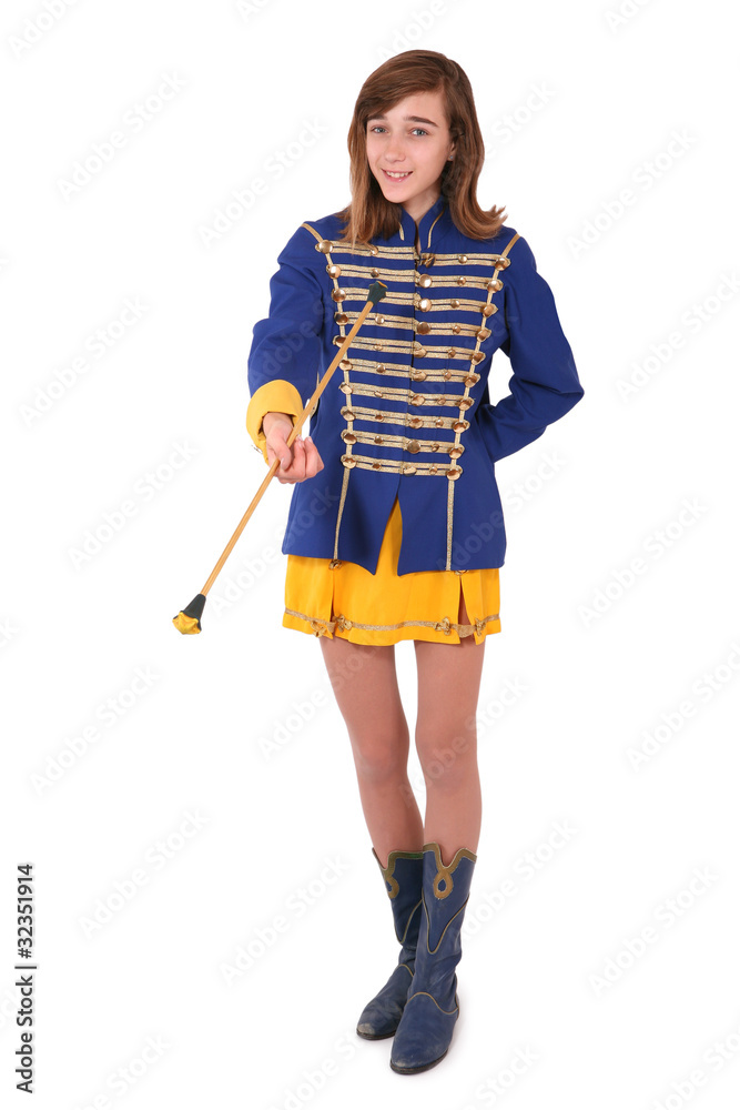 Teenage majorette in her uniform twirling a baton Teenage majorette in her uniform twirling a baton