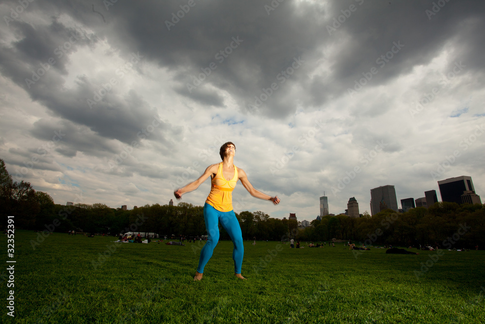 Young pretty woman in Yellow top in Central Park Young pretty woman in Yellow top in Central Park